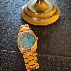 Michael Kors- Beautiful women’s large turquoise/gold- like new!